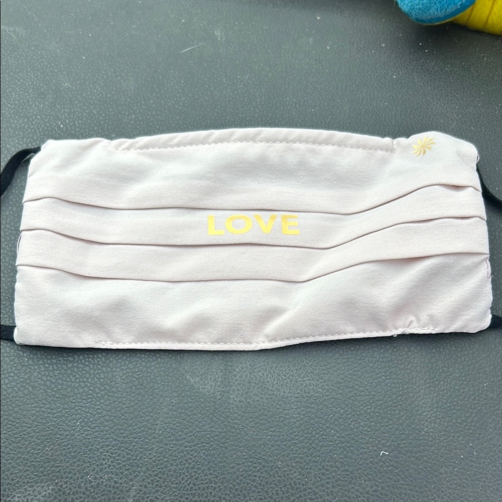 Athleta Face Mask in Light Pink with Yellow Accents